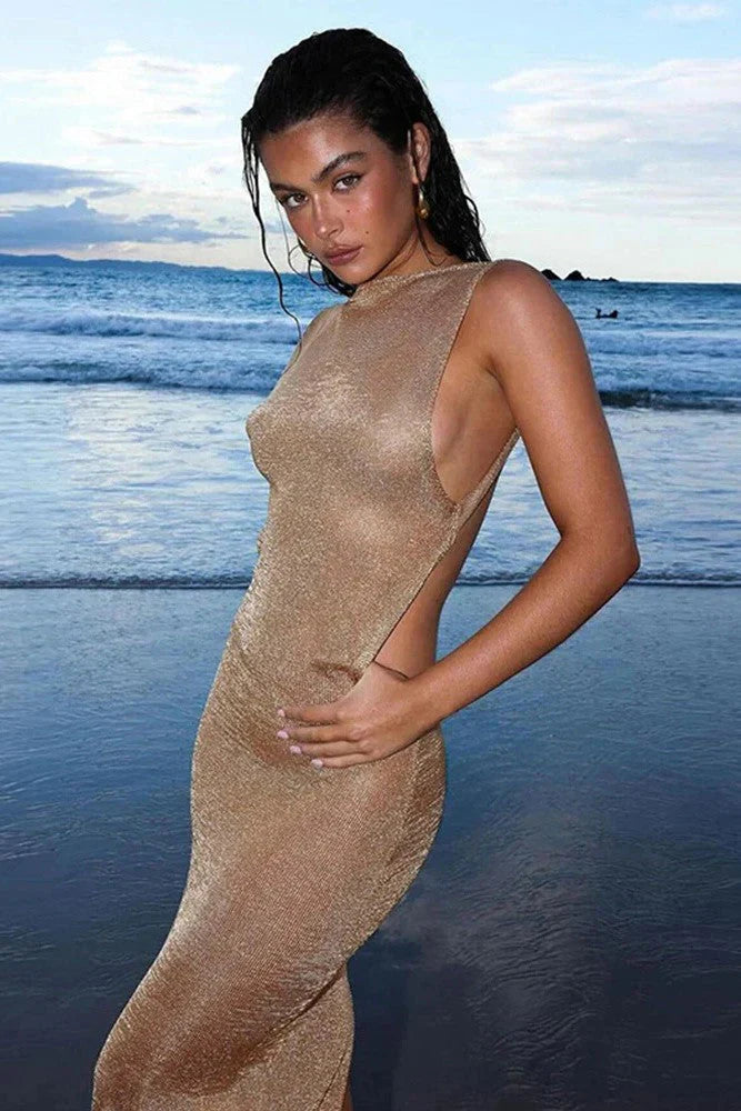 Eloura – Shimmer maxi dress with open back and minimalist cut