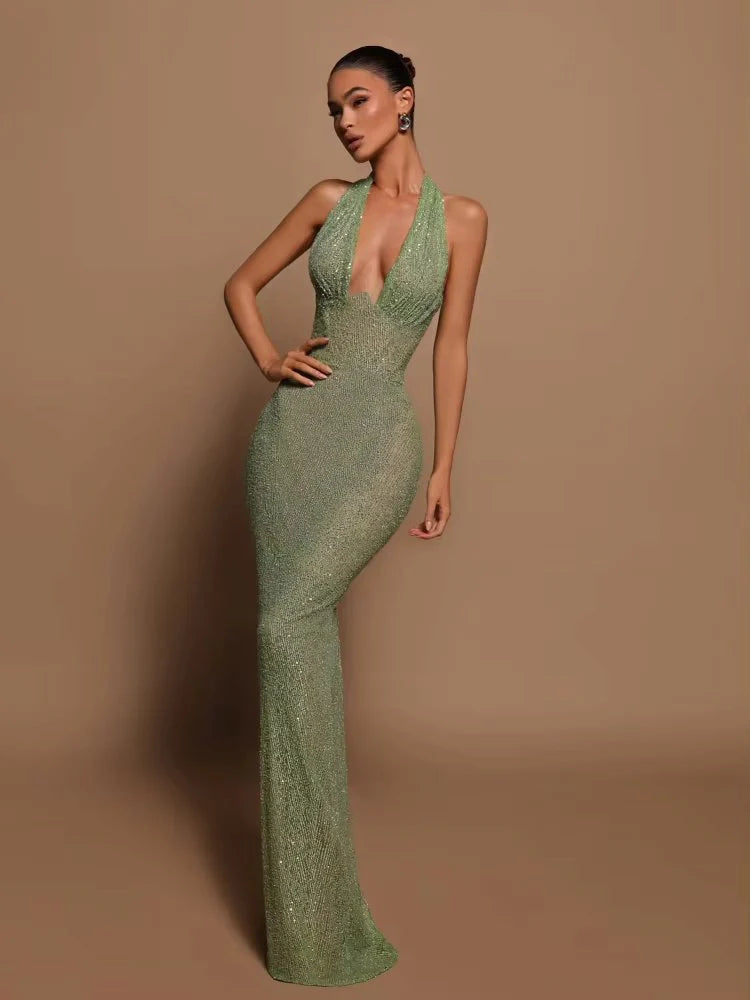 Selvara – Green sequin dress with open back and halter neckline